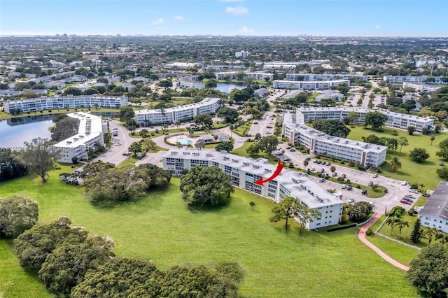 drone / aerial view with a water view