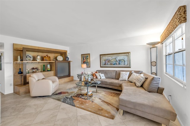 living room with light tile patterned floors