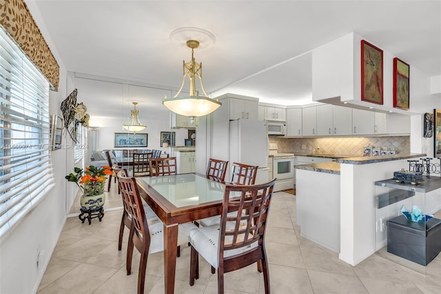 view of tiled dining area