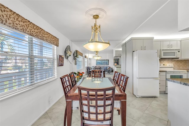 245 Grantham C 245, Deerfield Beach, FL 33442 - dining space featuring light tile patterned floors