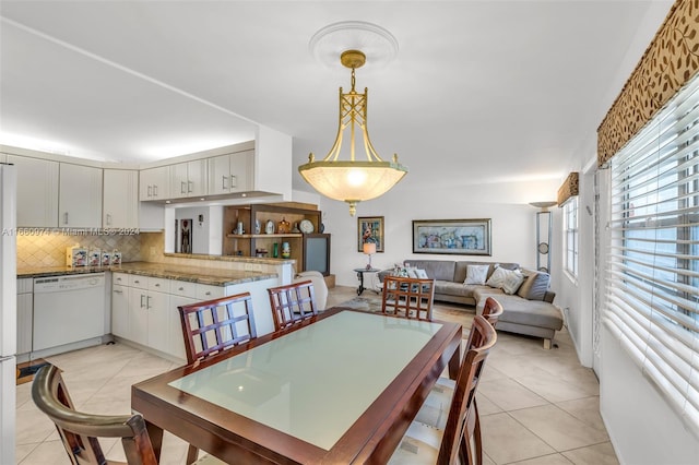 dining room featuring light tile patterned floors