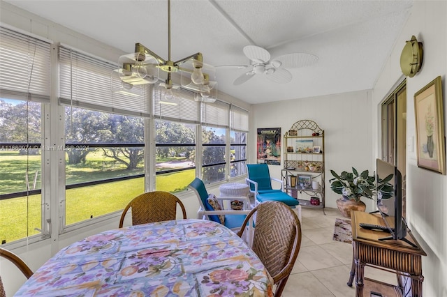 sunroom with ceiling fan