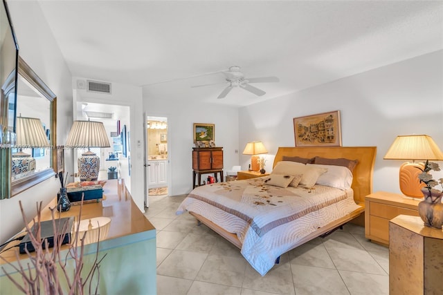 245 Grantham C 245, Deerfield Beach, FL 33442 - bedroom featuring light tile patterned flooring, ensuite bath, ceiling fan, and visible vents
