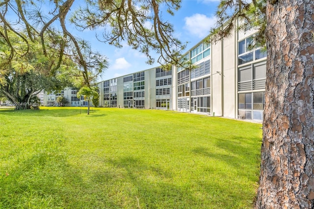 245 Grantham C 245, Deerfield Beach, FL 33442 - surrounding community with a yard