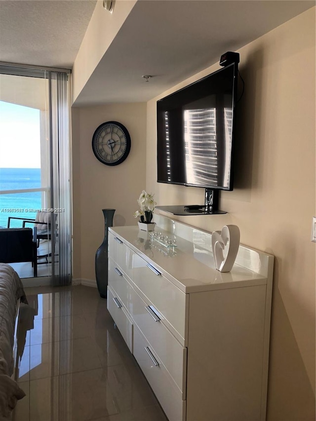 bathroom featuring a water view