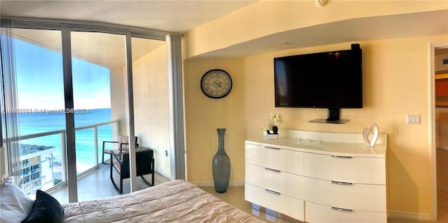 bedroom featuring light tile patterned floors