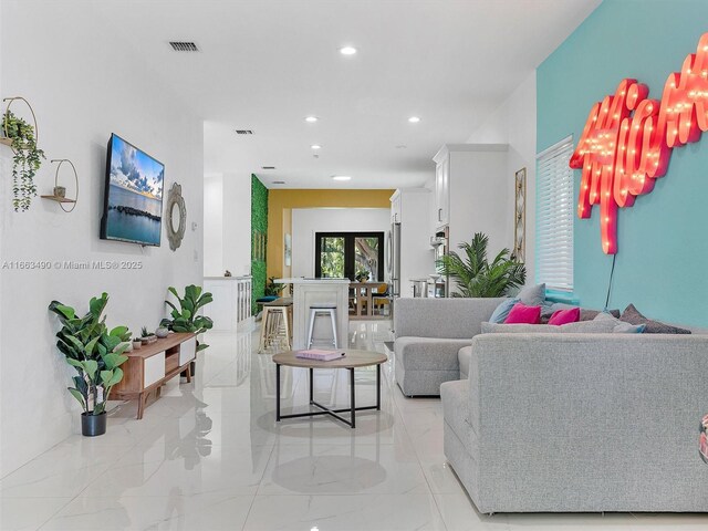 living room with a healthy amount of sunlight