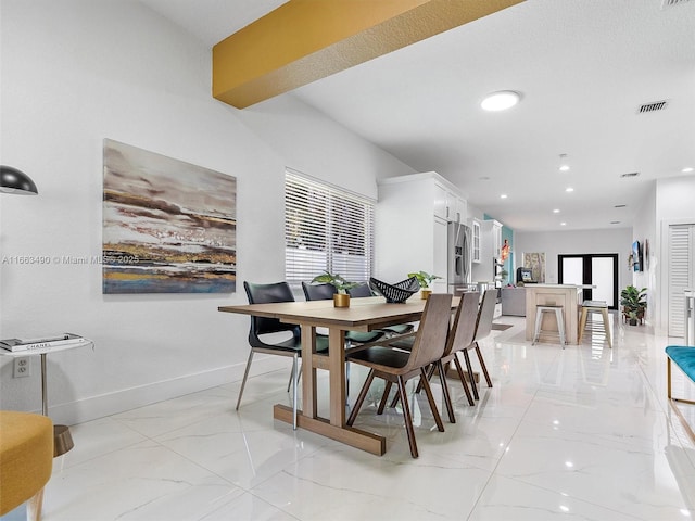 dining space featuring marble finish floor, baseboards, visible vents, and recessed lighting