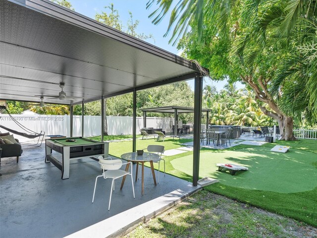 view of patio featuring a fire pit