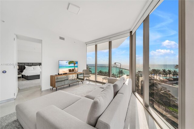 living room with a wall of windows