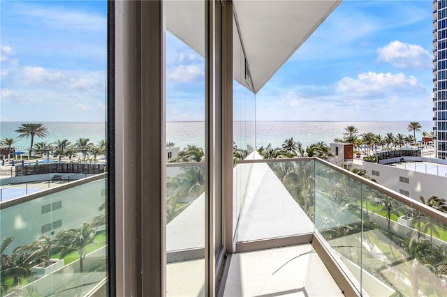 balcony featuring a water view