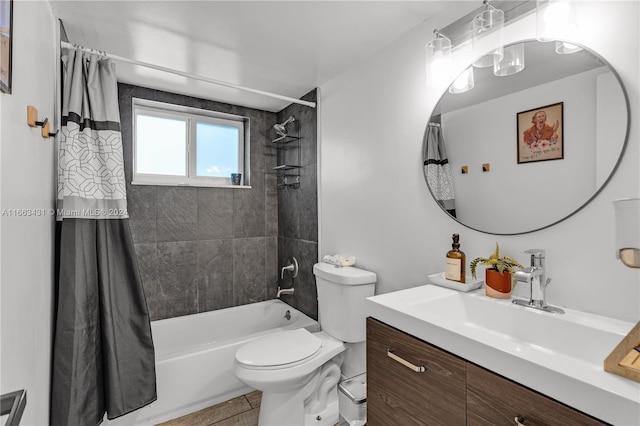 full bathroom with vanity, tile patterned flooring, shower / tub combo, and toilet