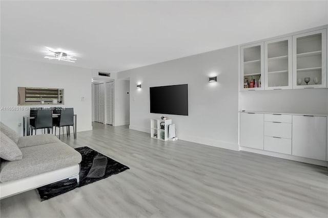 living room with light wood-type flooring