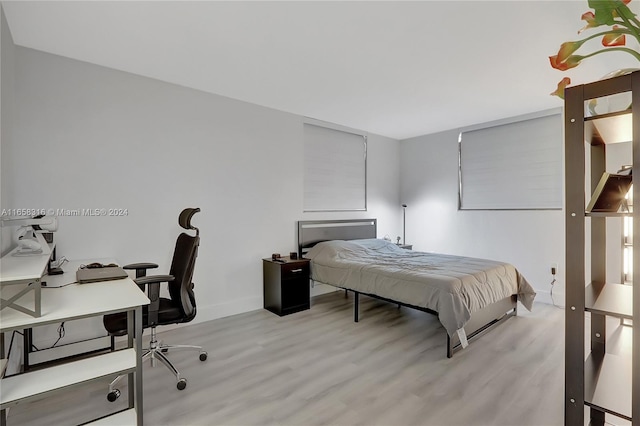 bedroom featuring light hardwood / wood-style flooring