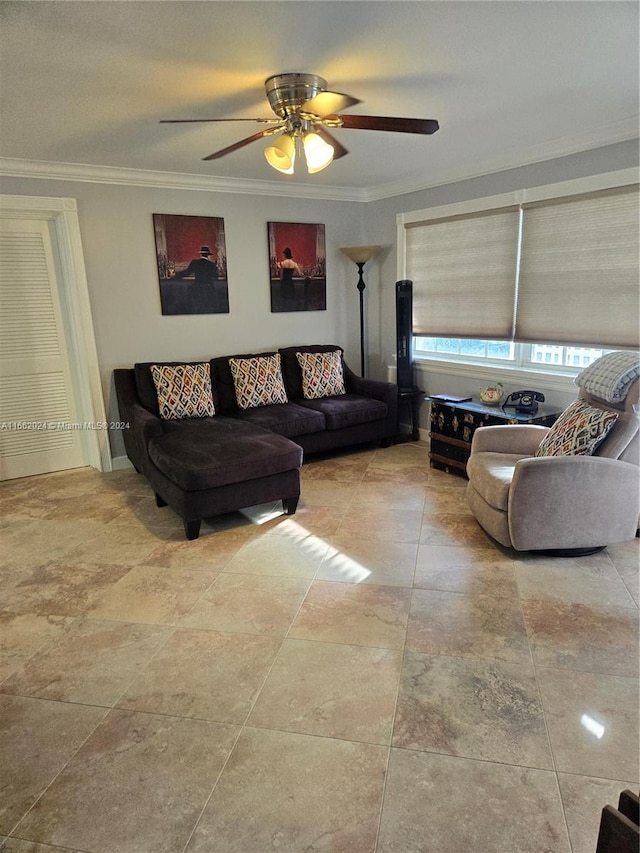 living room featuring ornamental molding and ceiling fan