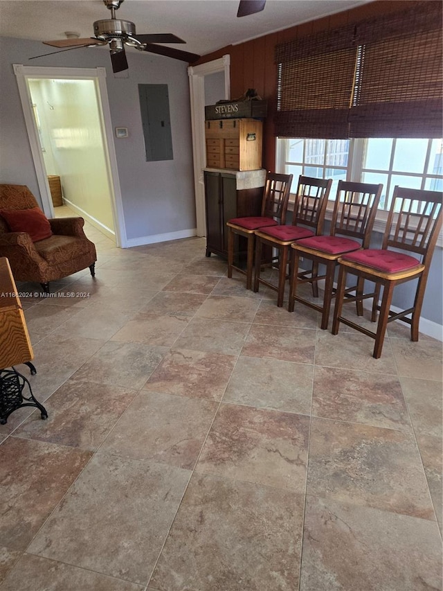 dining room featuring electric panel and ceiling fan