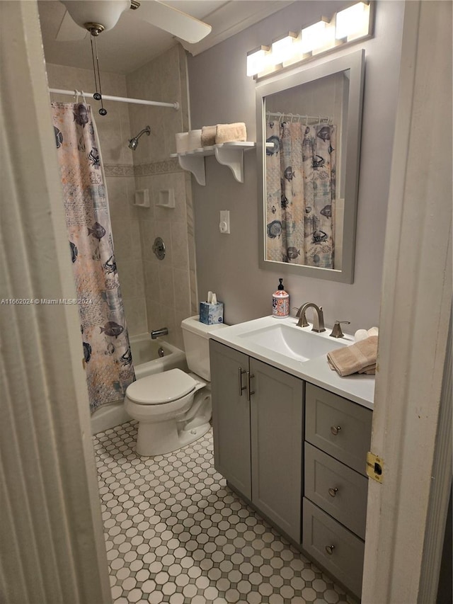 full bathroom with vanity, toilet, and shower / bath combination with curtain