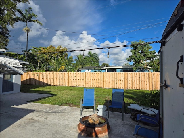 view of patio / terrace featuring a fire pit