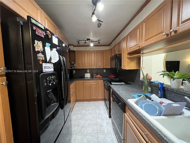 kitchen featuring black appliances, backsplash, light tile patterned floors, and ornamental molding