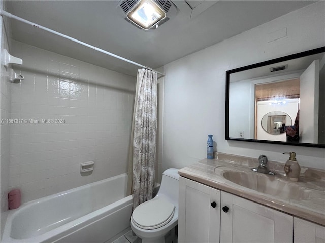 full bathroom featuring vanity, toilet, and shower / tub combo with curtain