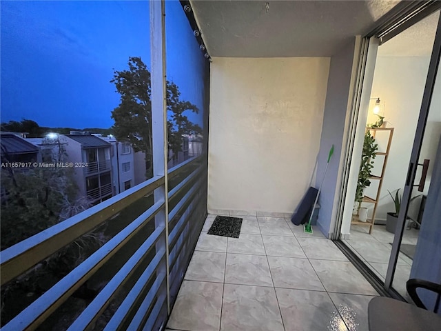 view of balcony at twilight