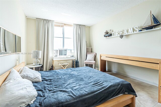 bedroom with a textured ceiling