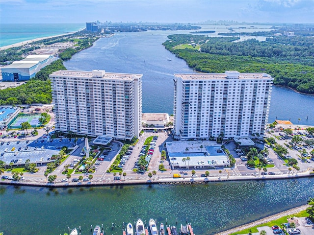 birds eye view of property featuring a water view