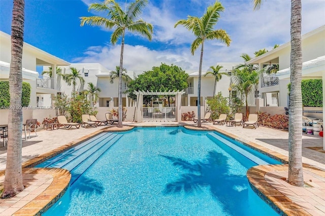 view of swimming pool with a patio