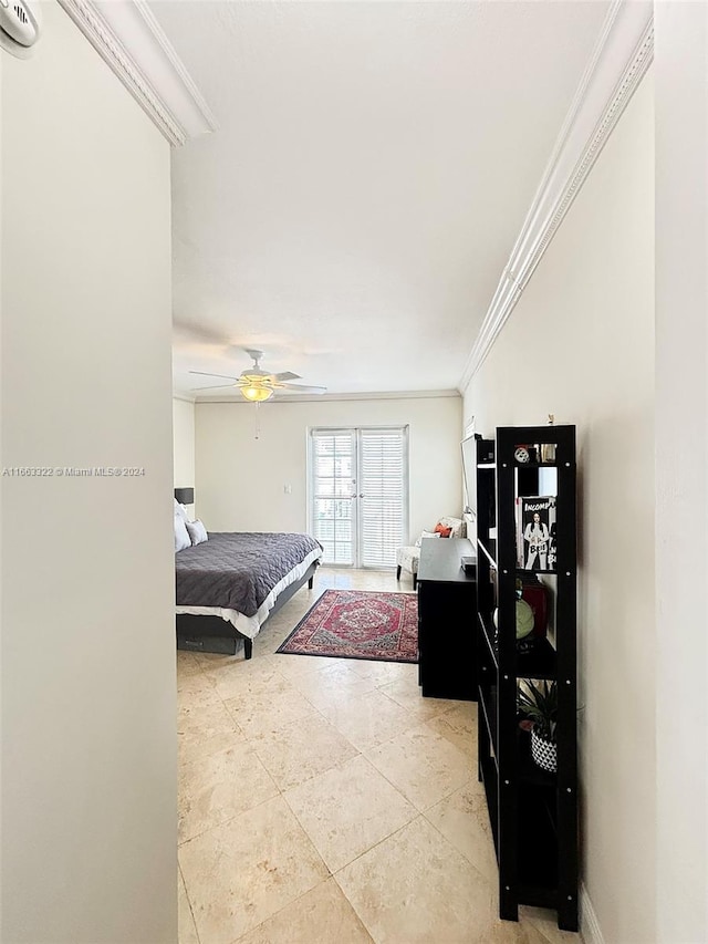 bedroom with ornamental molding and ceiling fan