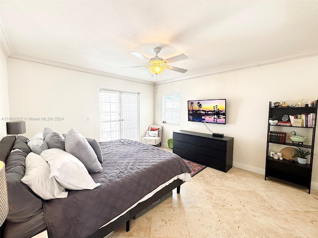 bedroom featuring a textured ceiling, ceiling fan, and crown molding