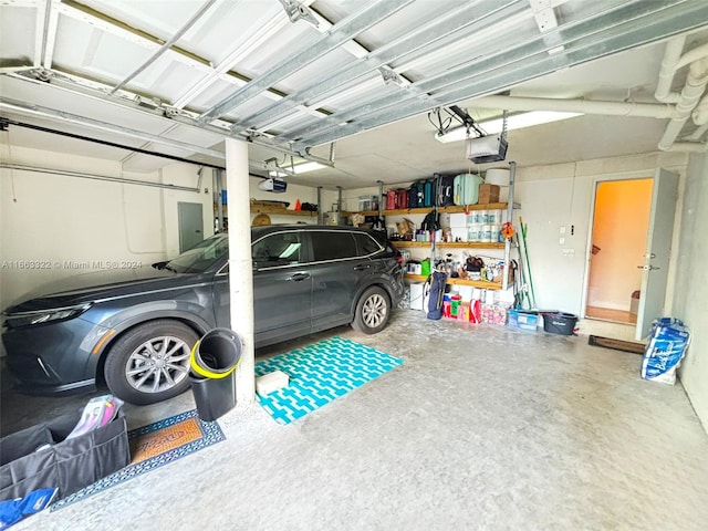 garage featuring a garage door opener