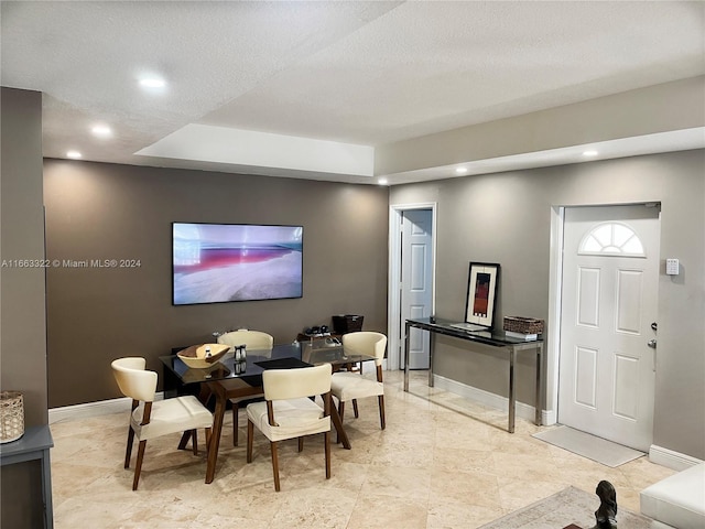 interior space with a textured ceiling