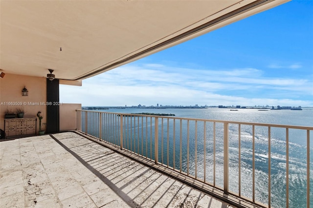 balcony featuring a water view