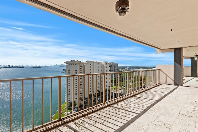 balcony featuring a water view