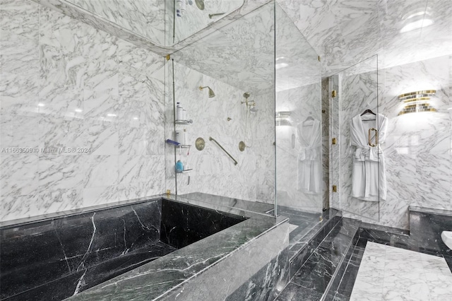 bathroom featuring tile walls and plus walk in shower