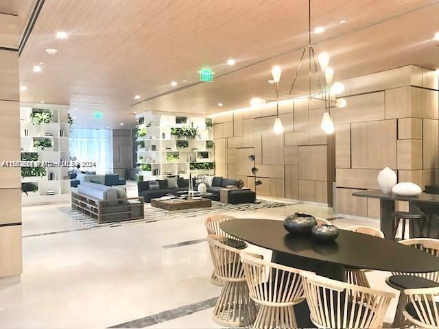 45 SW 9th St Unit 3009, Miami, FL 33130 - dining space with concrete floors