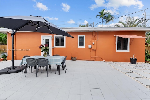 rear view of house featuring a patio area