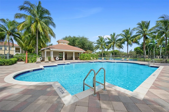 view of pool featuring a patio