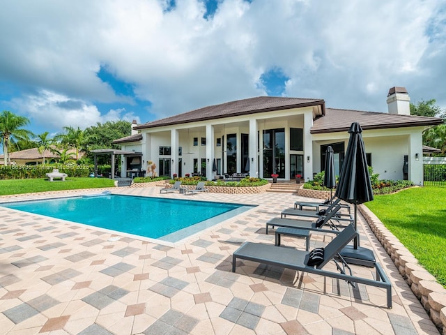 back of house featuring a patio