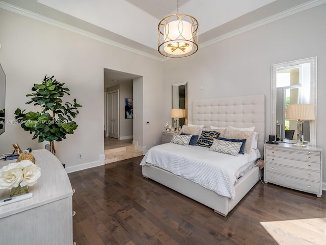 bedroom with a notable chandelier, crown molding, and dark hardwood / wood-style floors