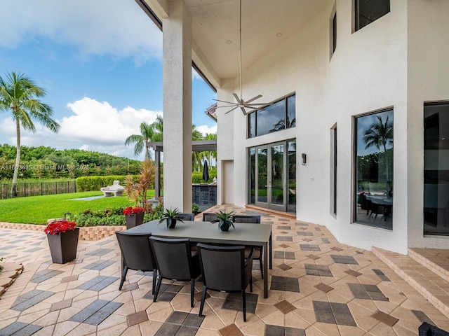 view of patio / terrace featuring ceiling fan