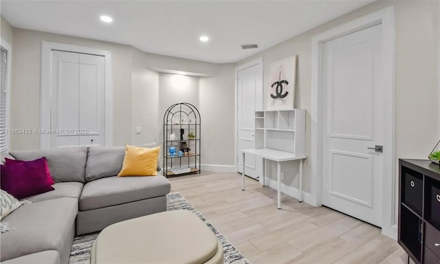 living room featuring light hardwood / wood-style flooring