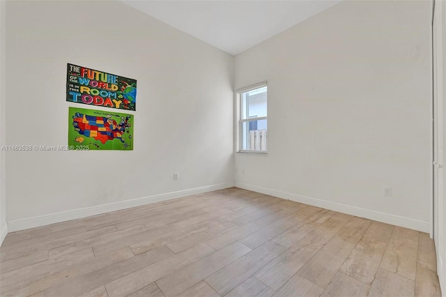 unfurnished room with light hardwood / wood-style floors