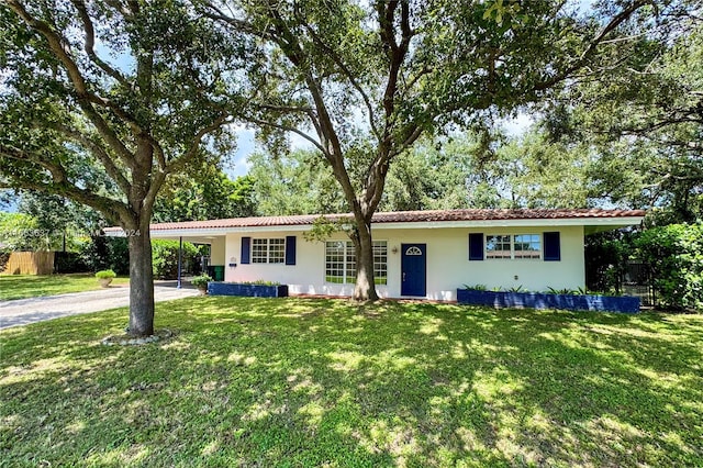 single story home with a front yard