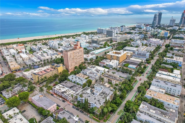 aerial view featuring a water view and a view of the beach