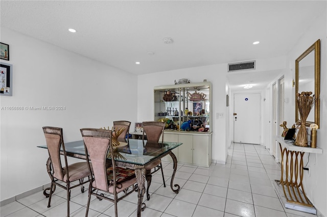 dining room featuring light tile patterned floors