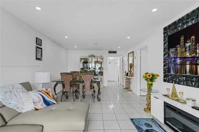 living room with light tile patterned floors