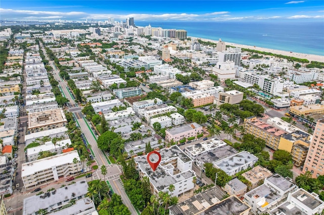 aerial view with a beach view and a water view