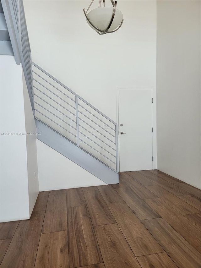 stairway with wood-type flooring