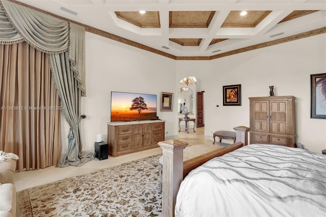 carpeted bedroom with beam ceiling, coffered ceiling, and crown molding